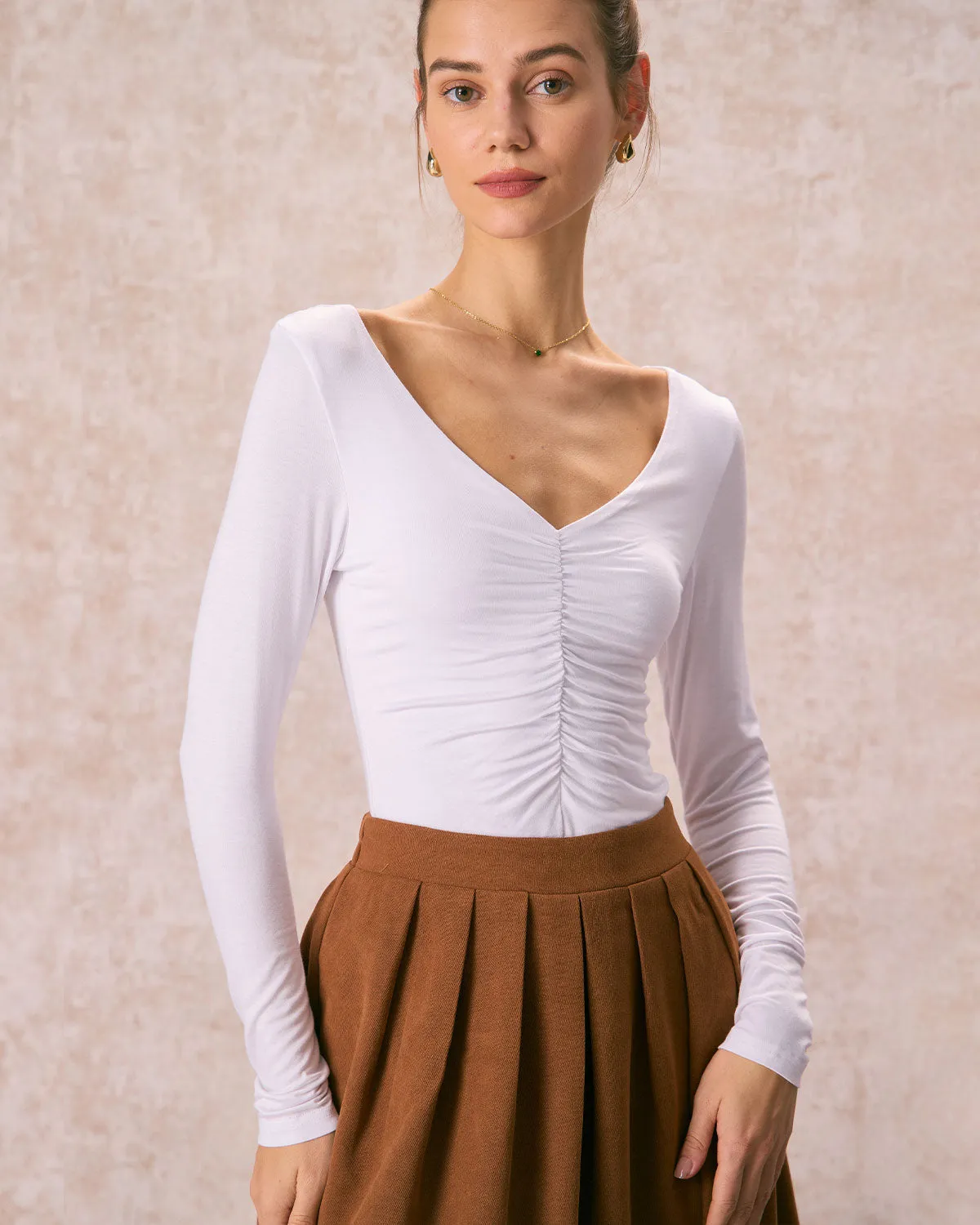 The White V Neck Ruched Long Sleeve Tee sold by rihoas product image thumbnail 4