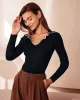 The Black Lapel Seam Colorblock Knit Top sold by rihoas