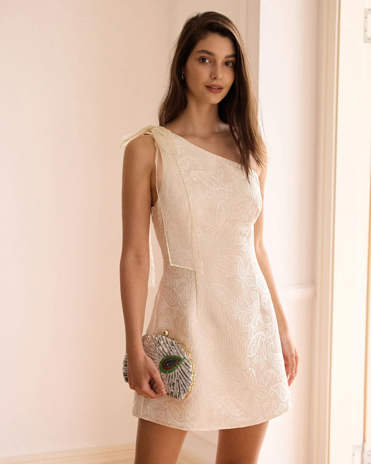 The Beige One-Shoulder Jacquard Mini Dress sold by rihoas