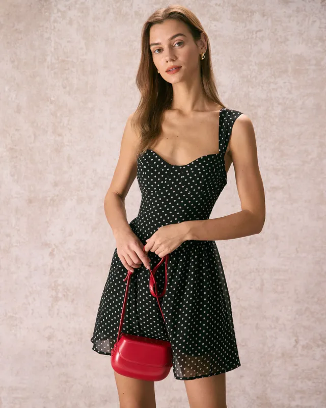 The Black Sweetheart Neck Polka Dot Mini Dress sold by rihoas