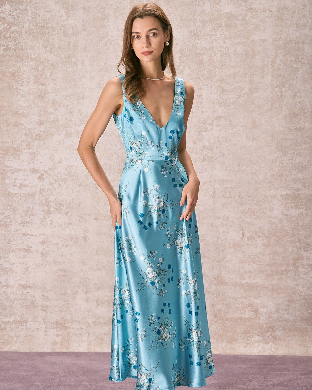 The Blue V Neck Floral Satin Maxi Dress sold by rihoas