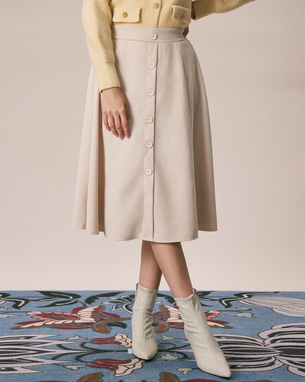 The Beige High Waisted Button Midi Skirt sold by rihoas