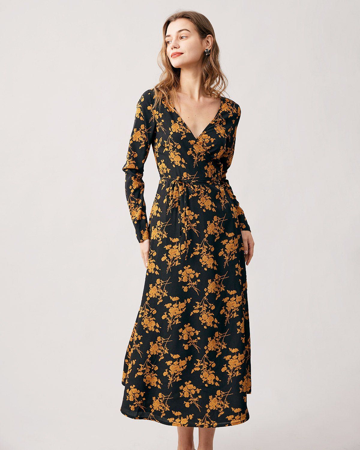 The Black V Neck Floral Long Sleeve Maxi Dress sold by rihoas
