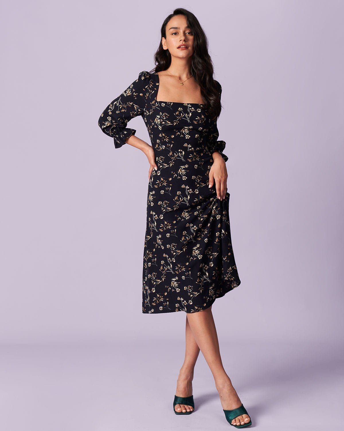 The Black Floral Lantern Sleeve Midi Dress sold by rihoas