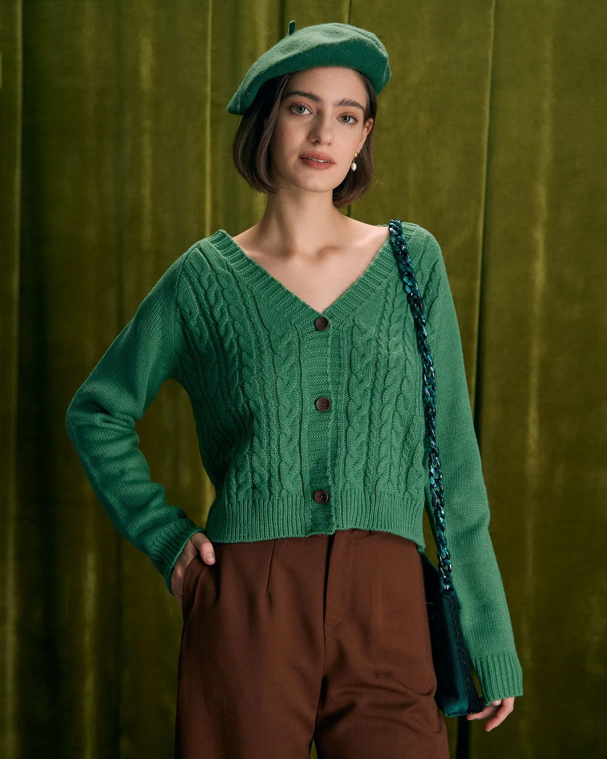 The Green V Neck Ribbed Cable Cardigan sold by rihoas