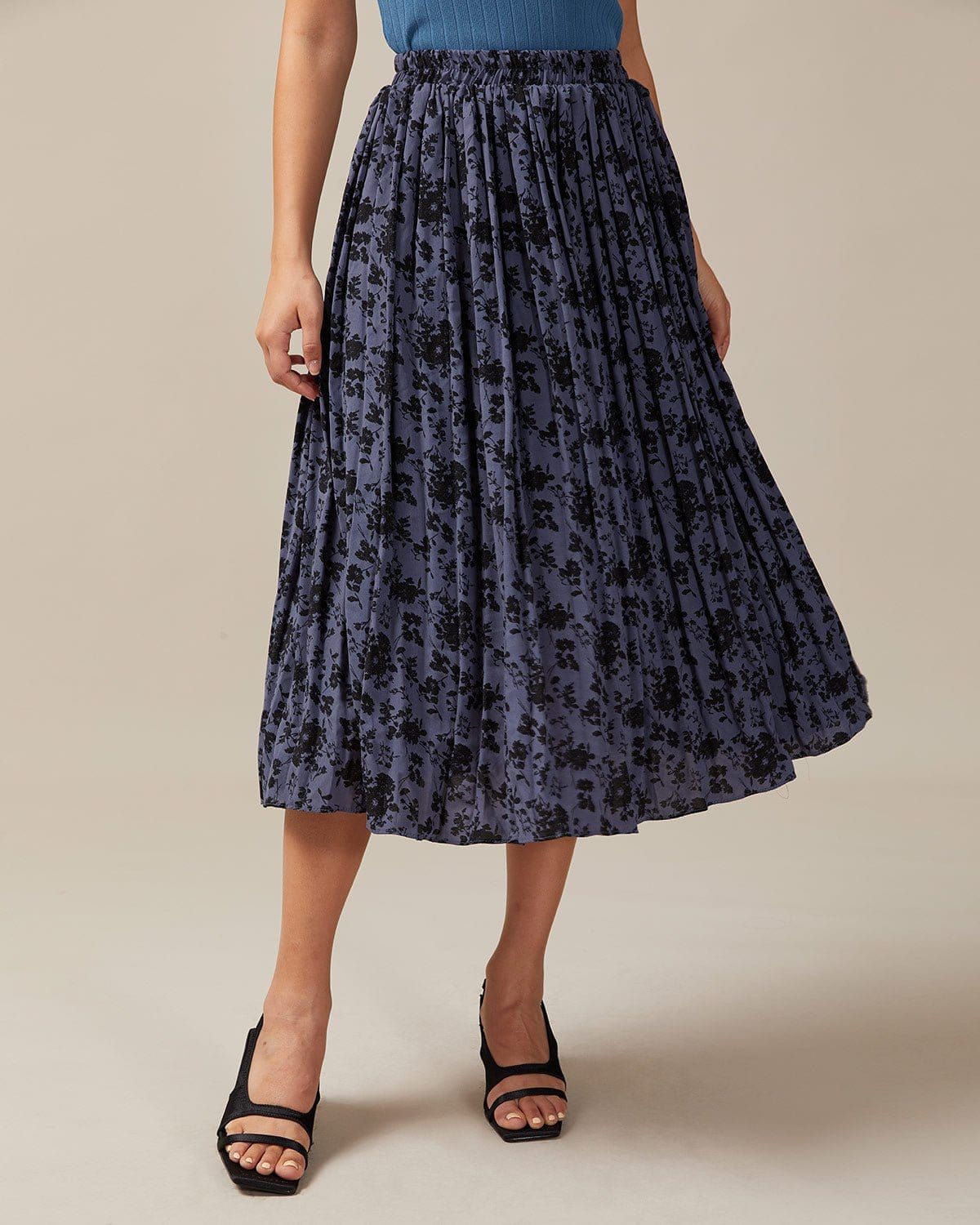 The Elastic Waist Floral Pleated Midi Skirt sold by rihoas