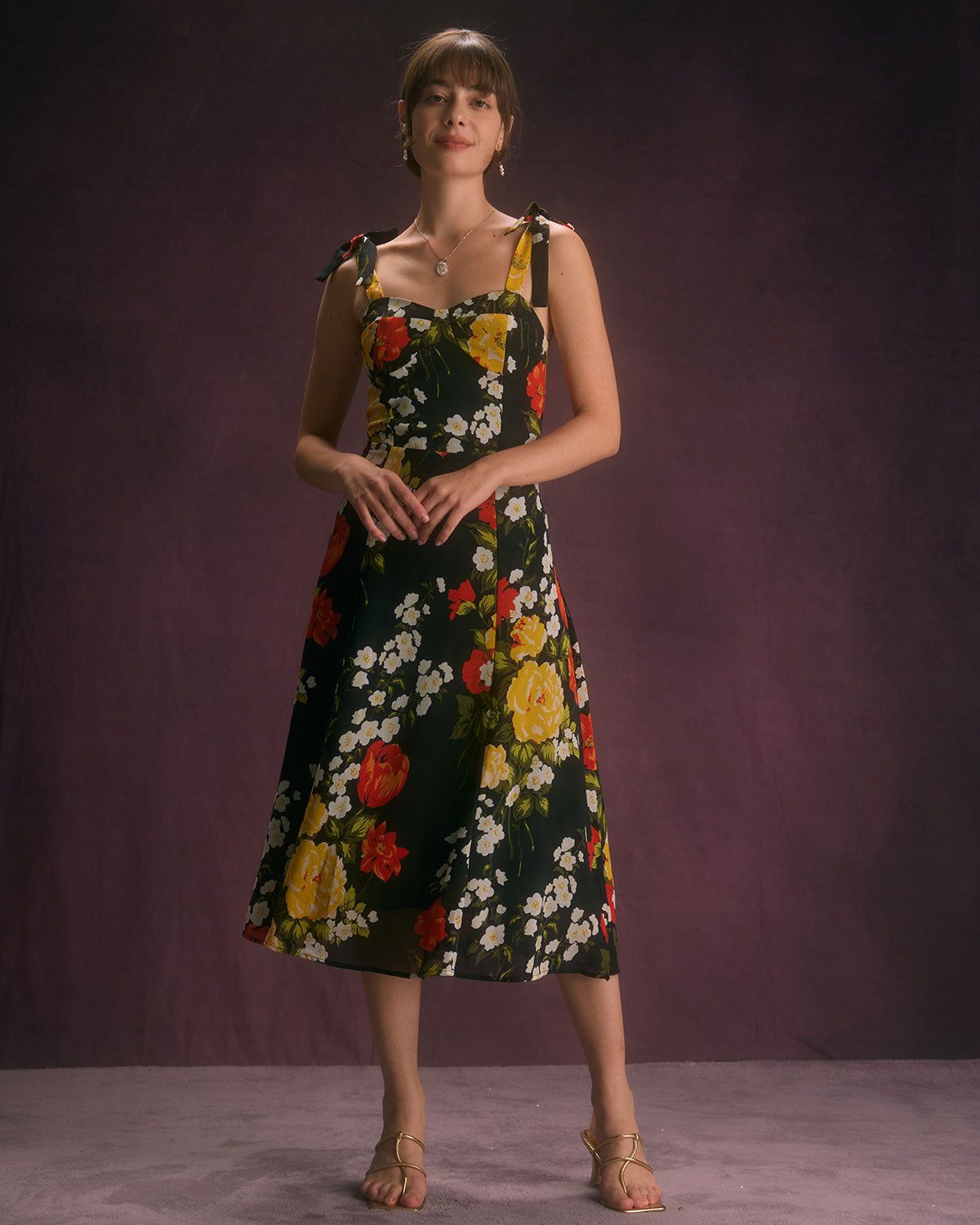 The Black Floral Ruffle Tie Shoulder Midi Dress sold by rihoas