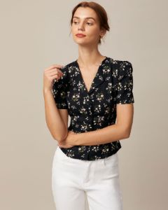 The Black V Neck Floral Tie Back Shirt sold by rihoas