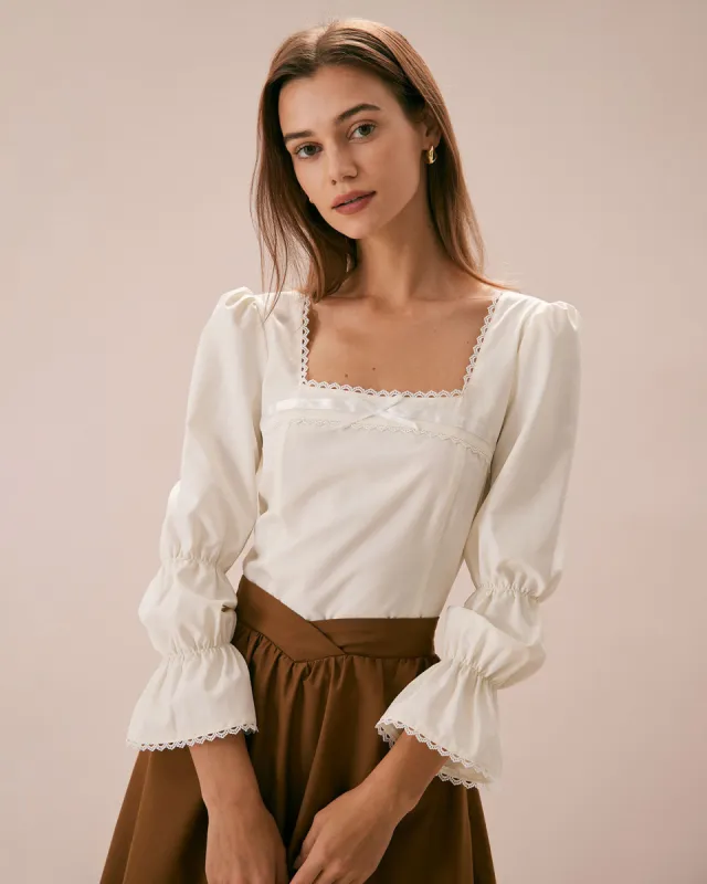 The Apricot Square Neck Lace Trim Blouse sold by rihoas