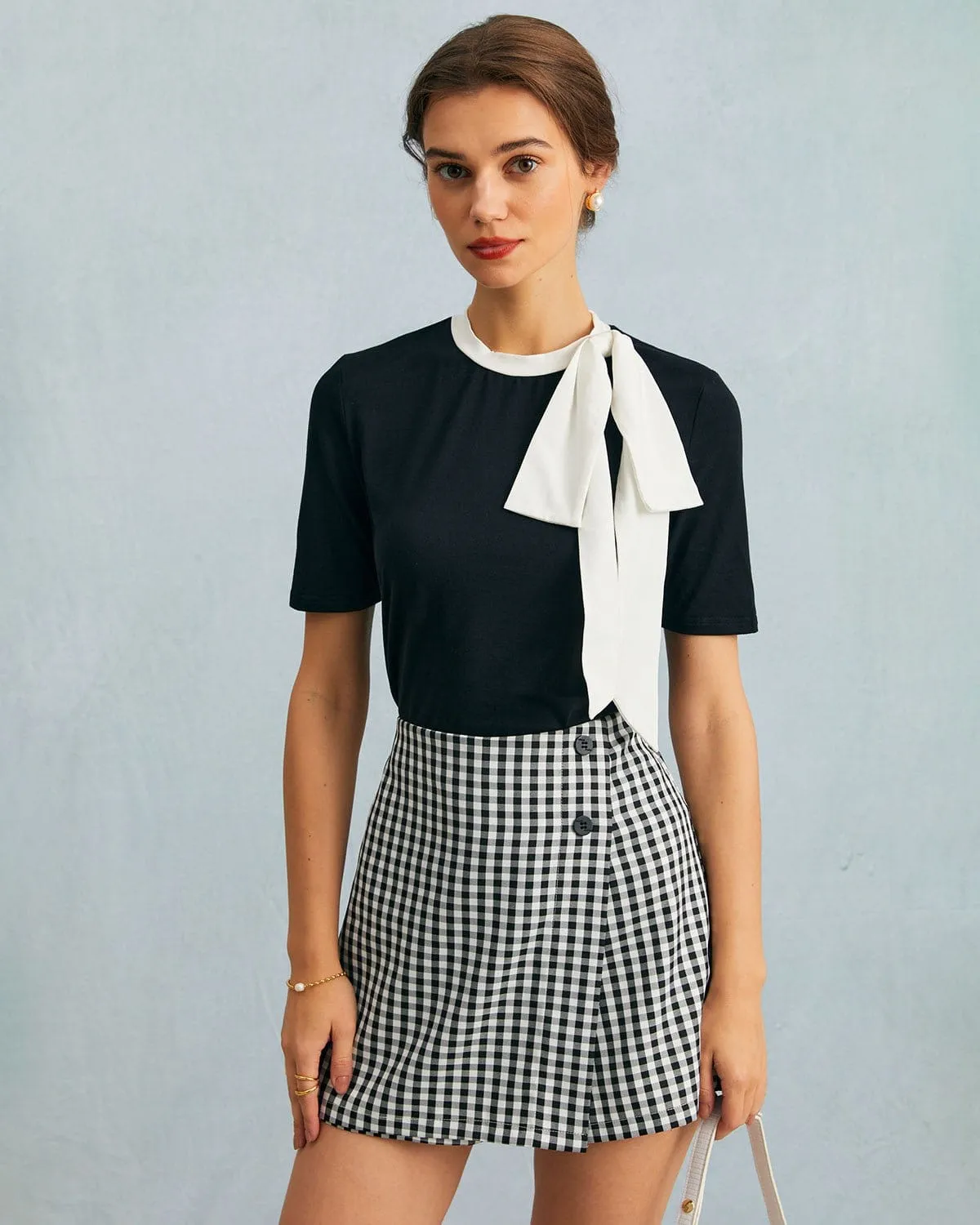The Black Round Neck Colorblock Bowknot Top sold by rihoas