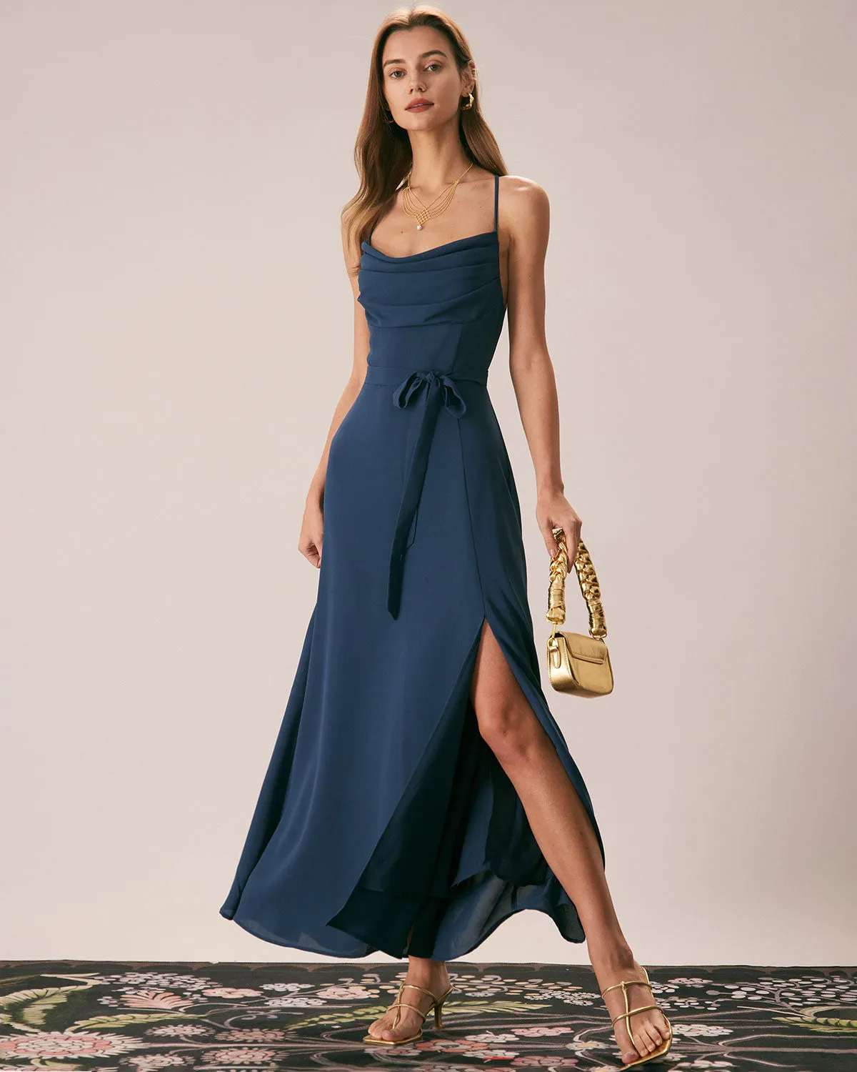 The Navy Cowl Neck Cutout Back Maxi Dress sold by rihoas