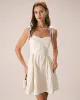 The Off White Jacquard Tie Strap Mini Dress sold by rihoas