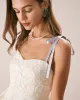 The Off White Jacquard Tie Strap Mini Dress sold by rihoas