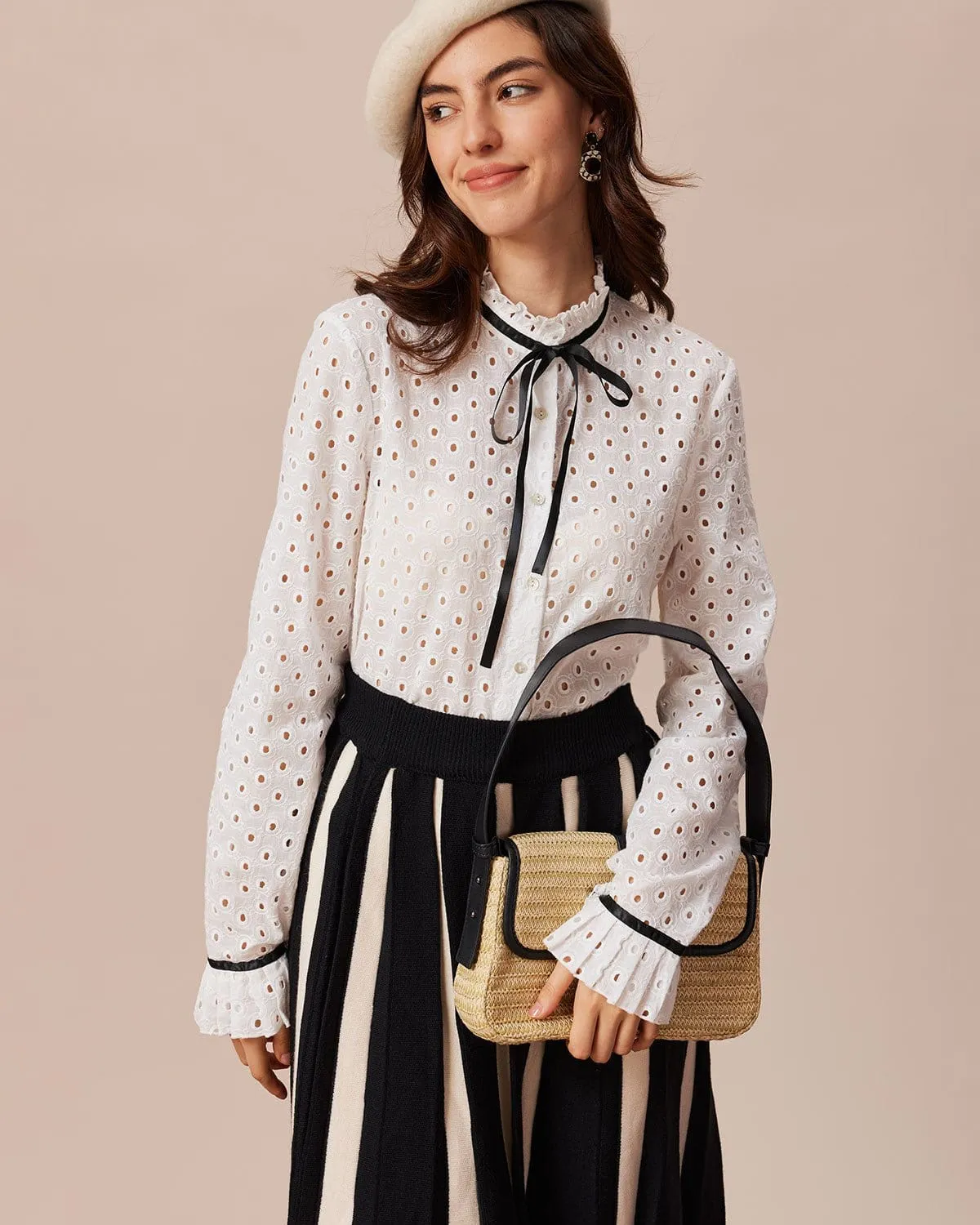 The White Mock Neck Polka Dot Cutout Blouse sold by rihoas