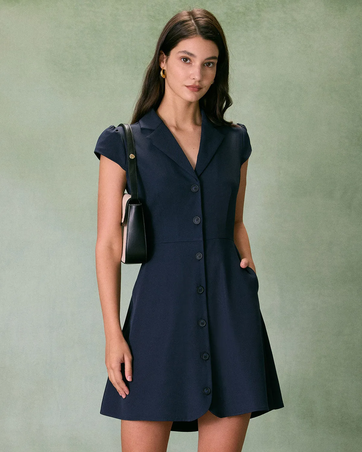The Navy Lapel Cap Sleeve Button-up Mini Dress sold by rihoas
