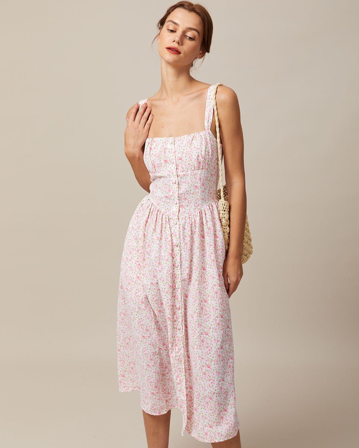 The Pink Square Neck Pleated Floral Midi Dress sold by rihoas