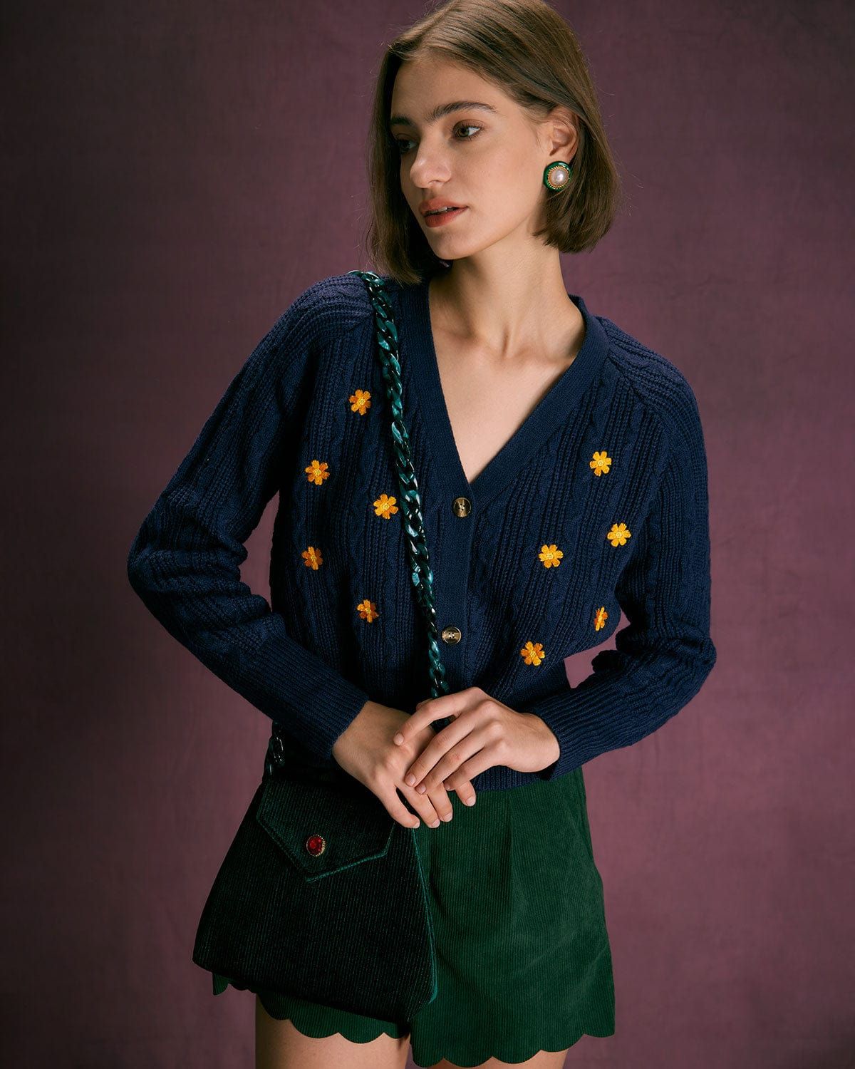 The Navy V Neck Floral Embroidery Cardigan sold by rihoas