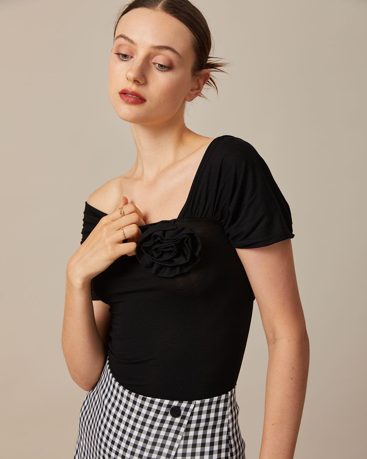 The Black Ruched Off The Shoulder Tee sold by rihoas