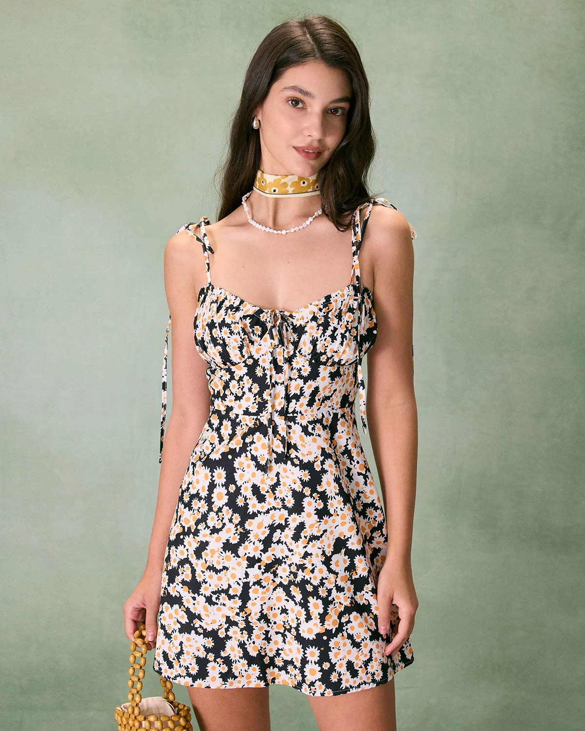 The Black Ruched Daisy Slip Mini Dress sold by rihoas