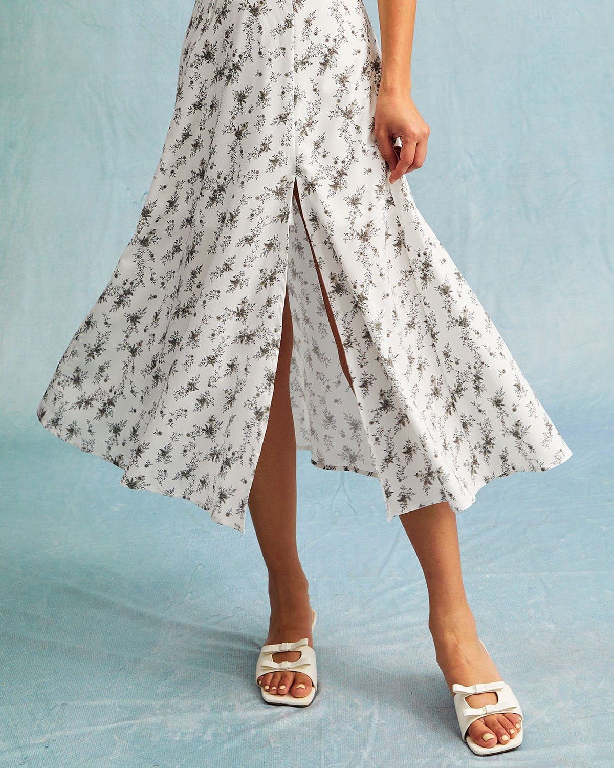 The White Sweetheart Neck Floral Cutout Midi Dress sold by rihoas product image thumbnail 3