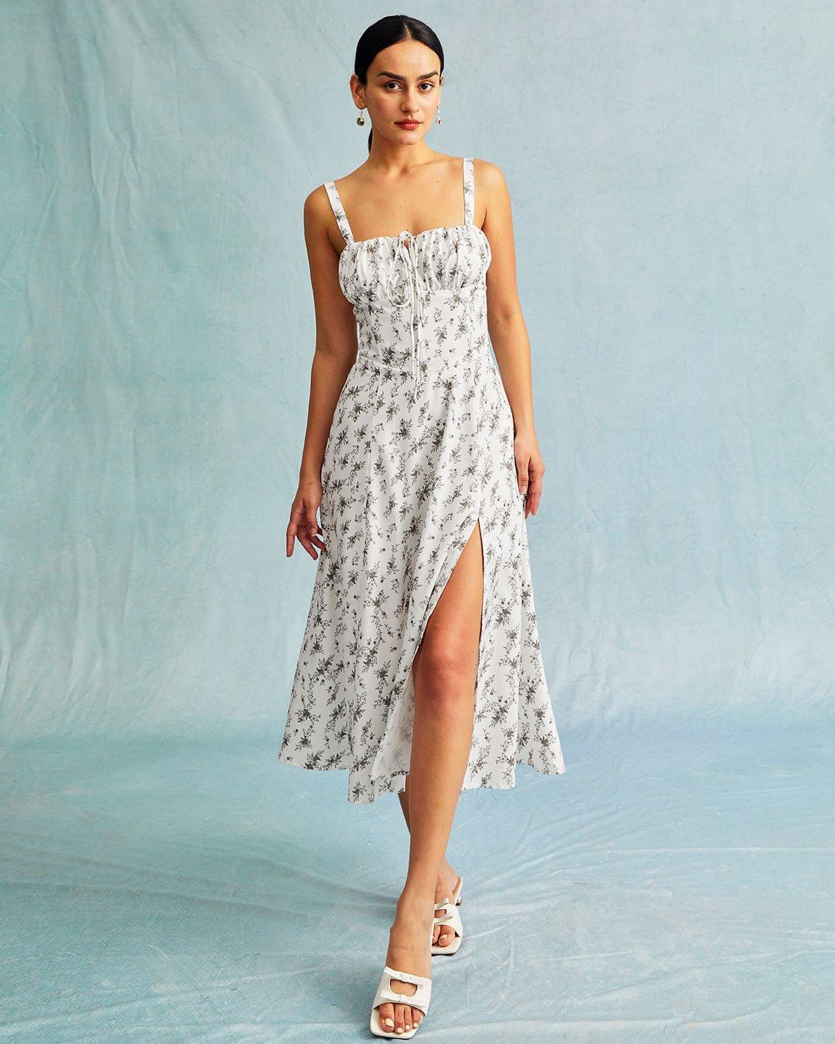 The White Sweetheart Neck Floral Cutout Midi Dress sold by rihoas