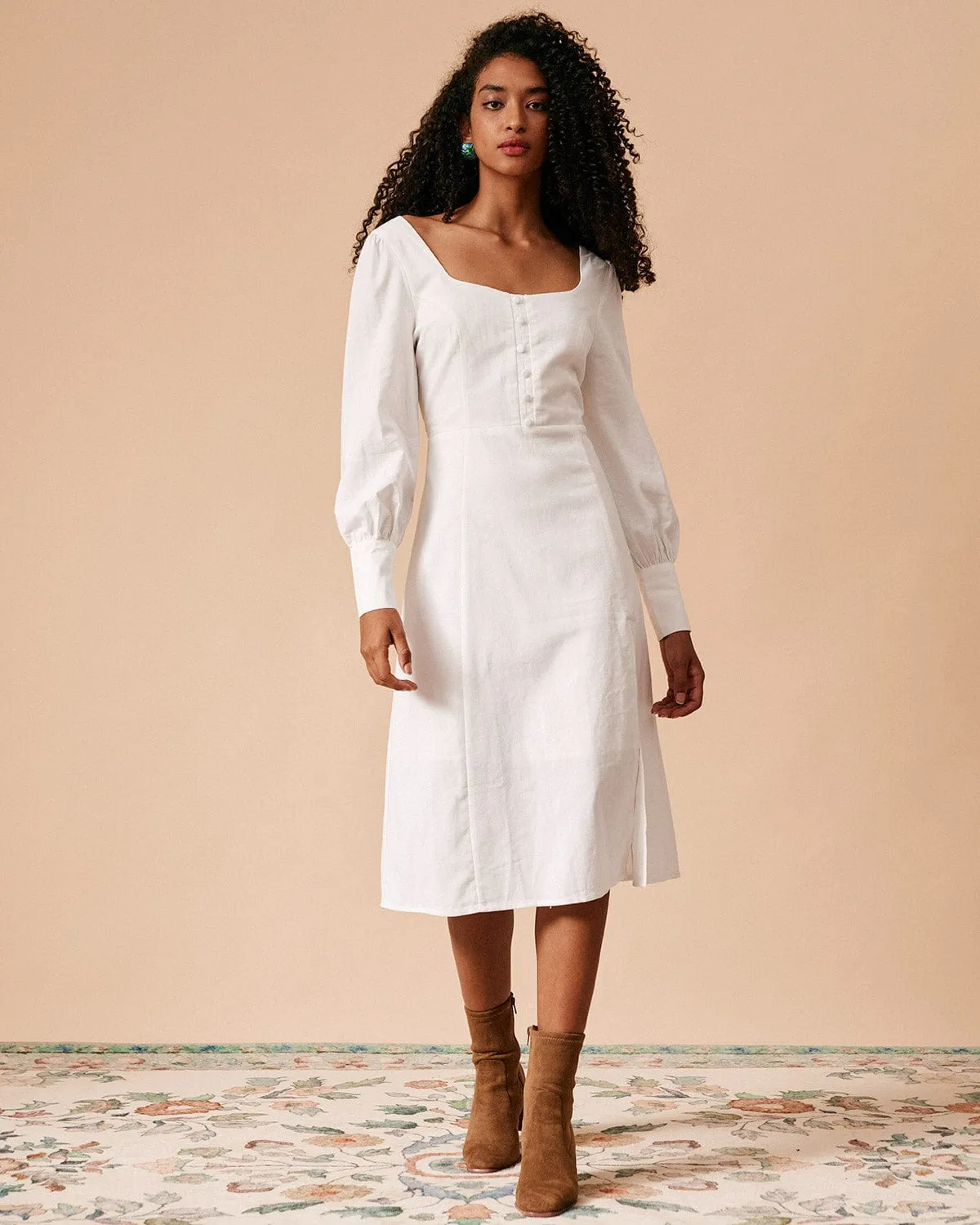 The White Solid Slit Long Sleeve Midi Dress sold by rihoas