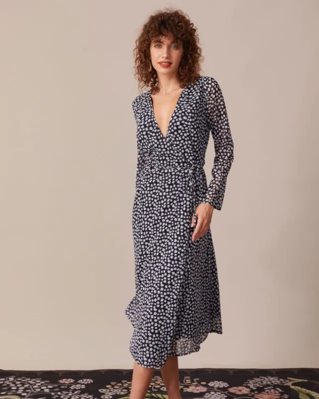 The Black V Neck Floral Tie Waist Midi Dress sold by rihoas