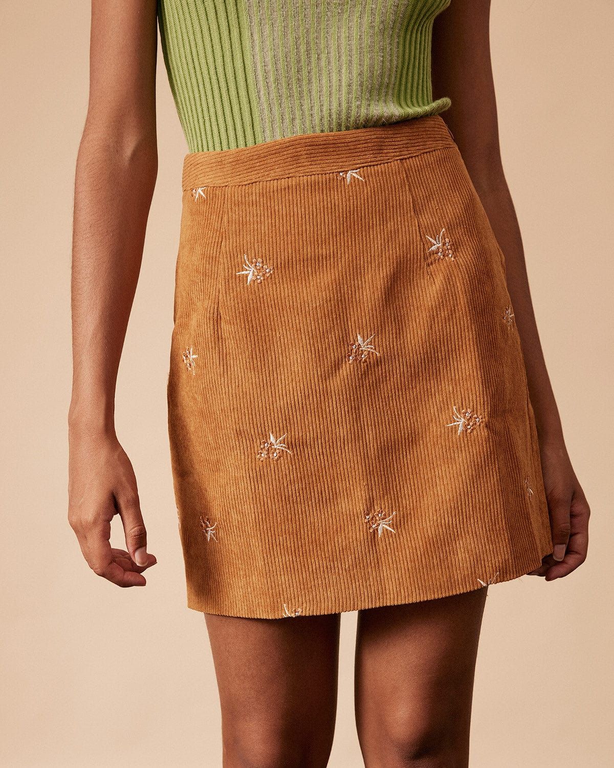 The Corduroy Embroidery High Waisted Mini Skirt sold by rihoas