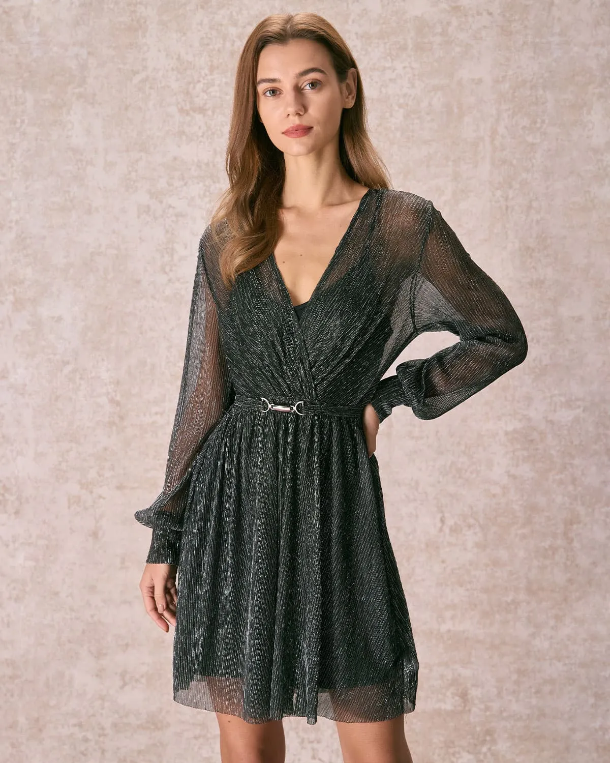 The Black V Neck Lurex Wrap Mini Dress sold by rihoas