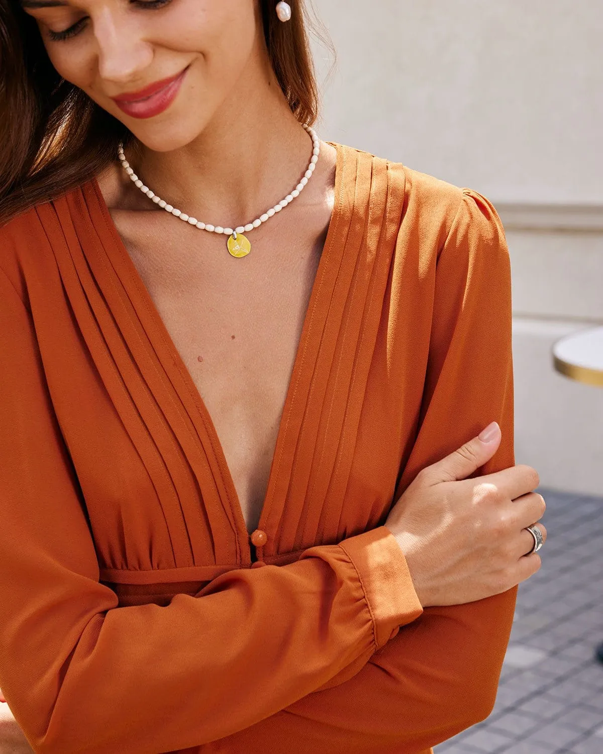 The Orange V Neck Pleated Flounce Blouse sold by rihoas product image thumbnail 3