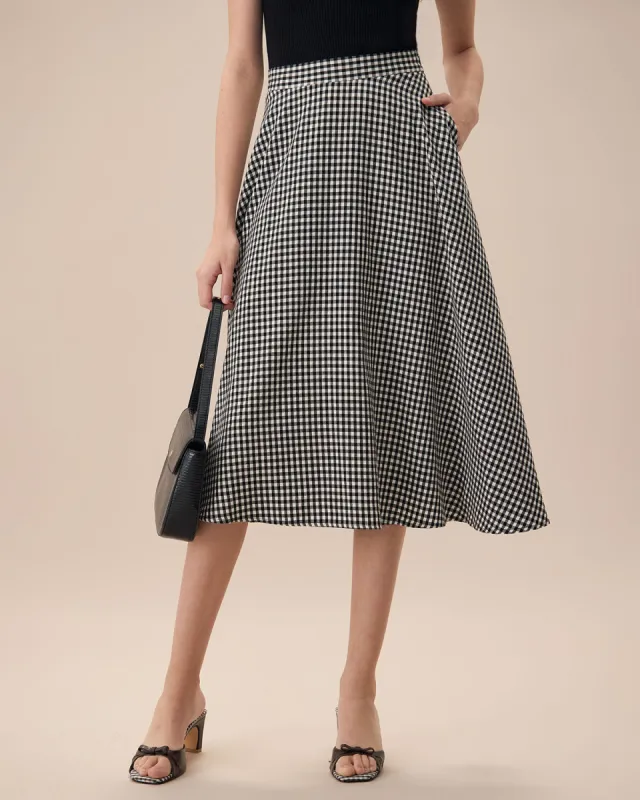 The Black High Waisted Plaid Pocket Midi Skirt sold by rihoas