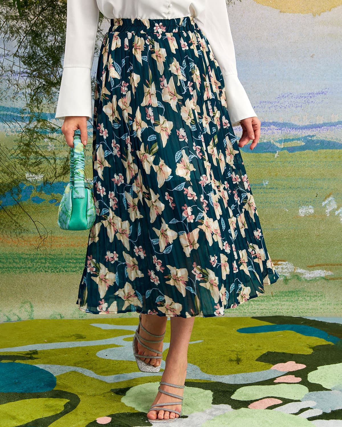 The Green Elastic Floral Pleated Midi Skirt sold by rihoas