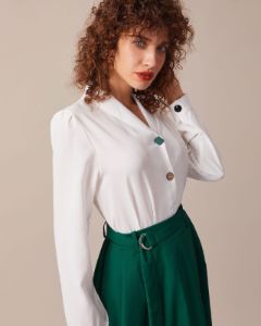 The White Lapel Button Long Sleeve Blouse sold by rihoas