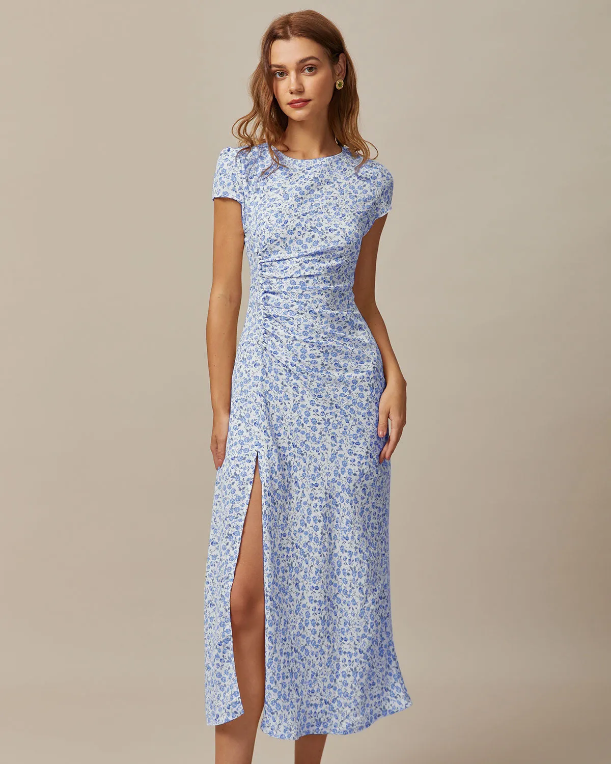 The Blue Round Neck Floral Slit Midi Dress sold by rihoas