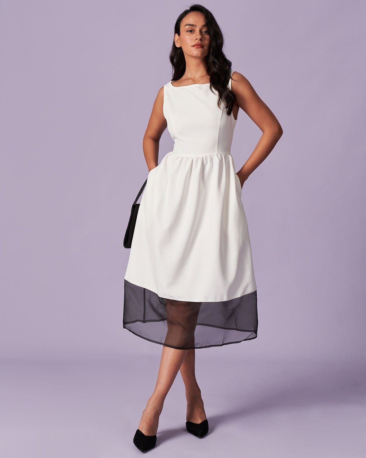 The White Round Neck Spliced Mesh Midi Dress sold by rihoas