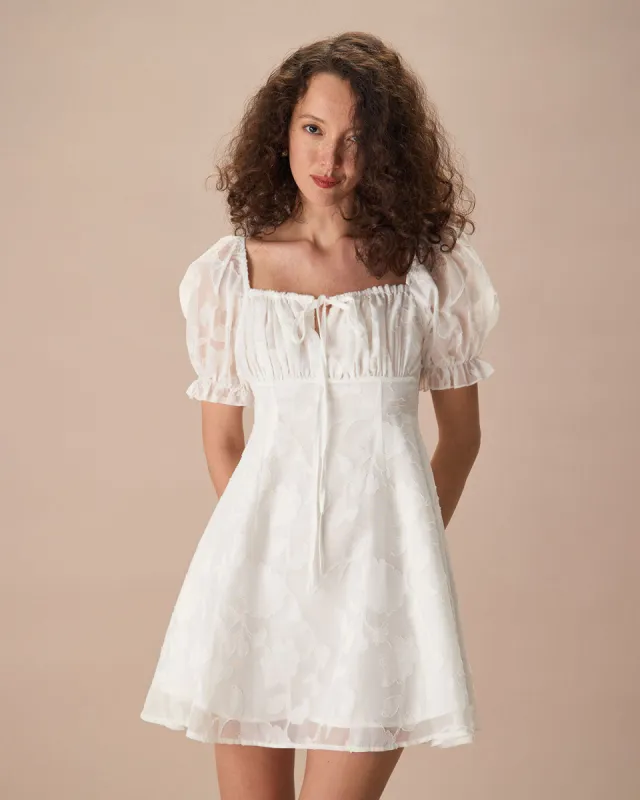 The White Square Neck Ruched Mini Dress sold by rihoas