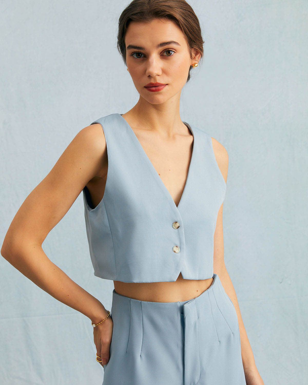 The Blue V Neck Ribbed Button Pointelle Knit Vest sold by rihoas