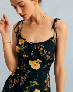 The Black High Waisted Floral Ruffle Mini Dress sold by rihoas