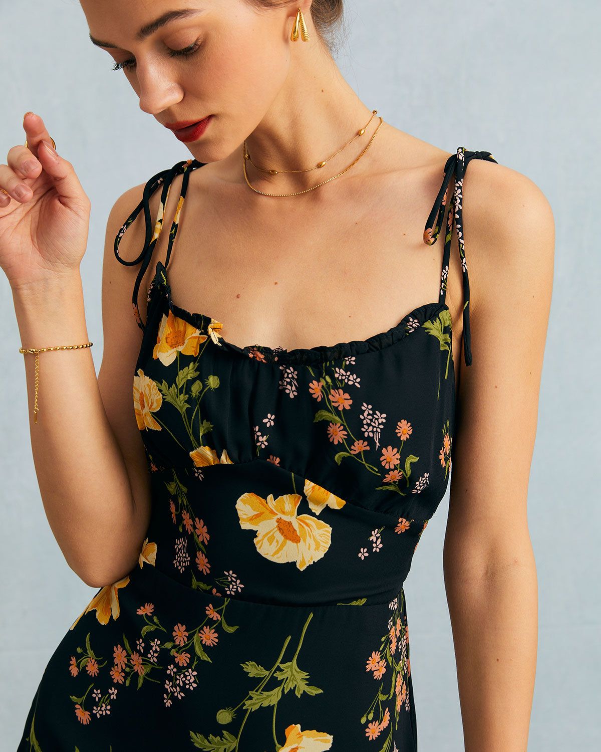 The Black High Waisted Floral Ruffle Mini Dress sold by rihoas product image thumbnail 2