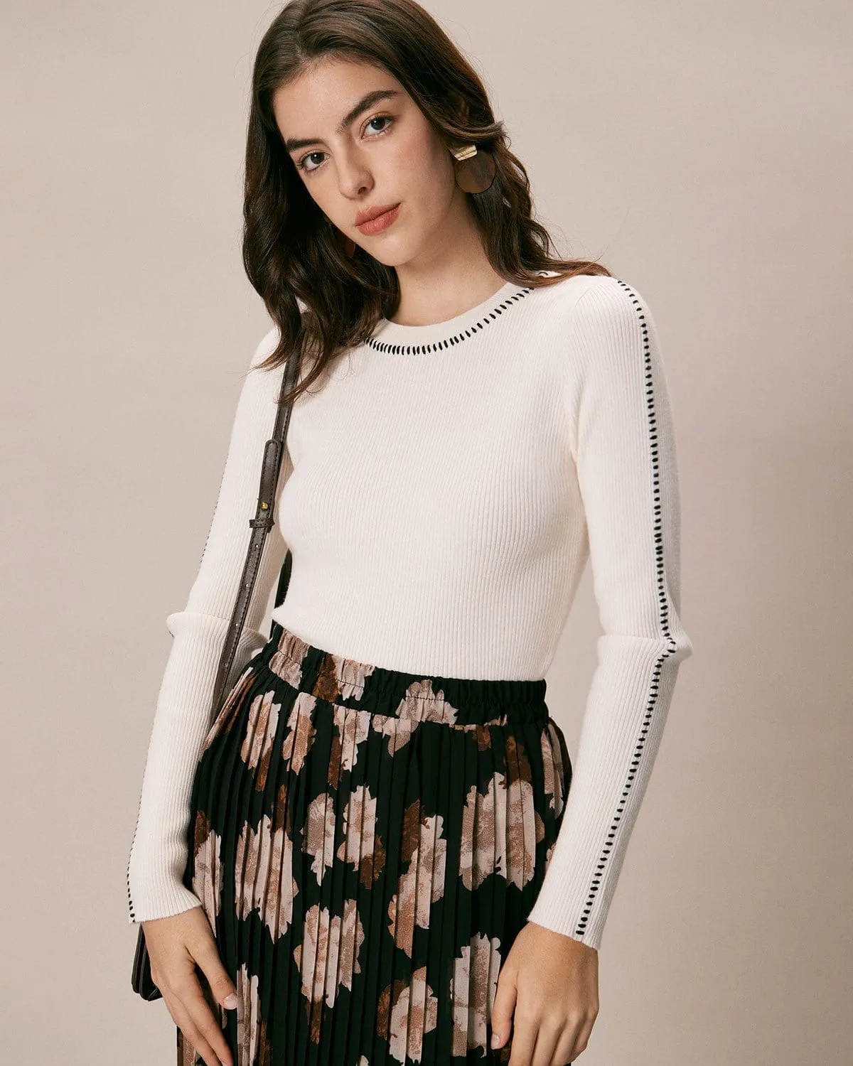 The Beige Seam Colorblock Ribbed Knit Top sold by rihoas