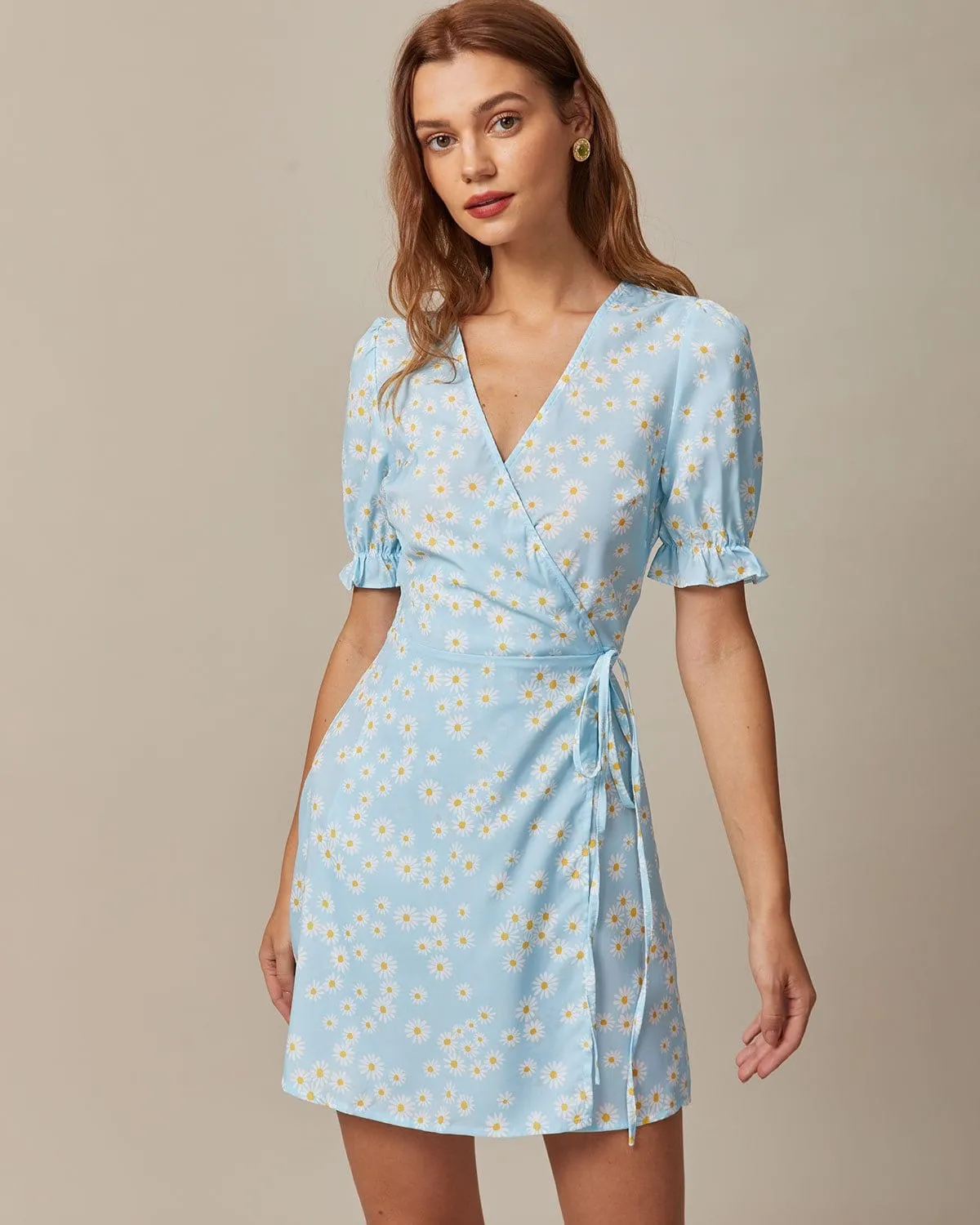 The Blue V Neck Floral Daisy Wrap Mini Dress sold by rihoas