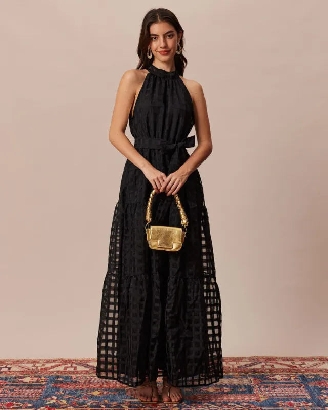 The Black Halter Tiered Cut Out Maxi Dress sold by rihoas