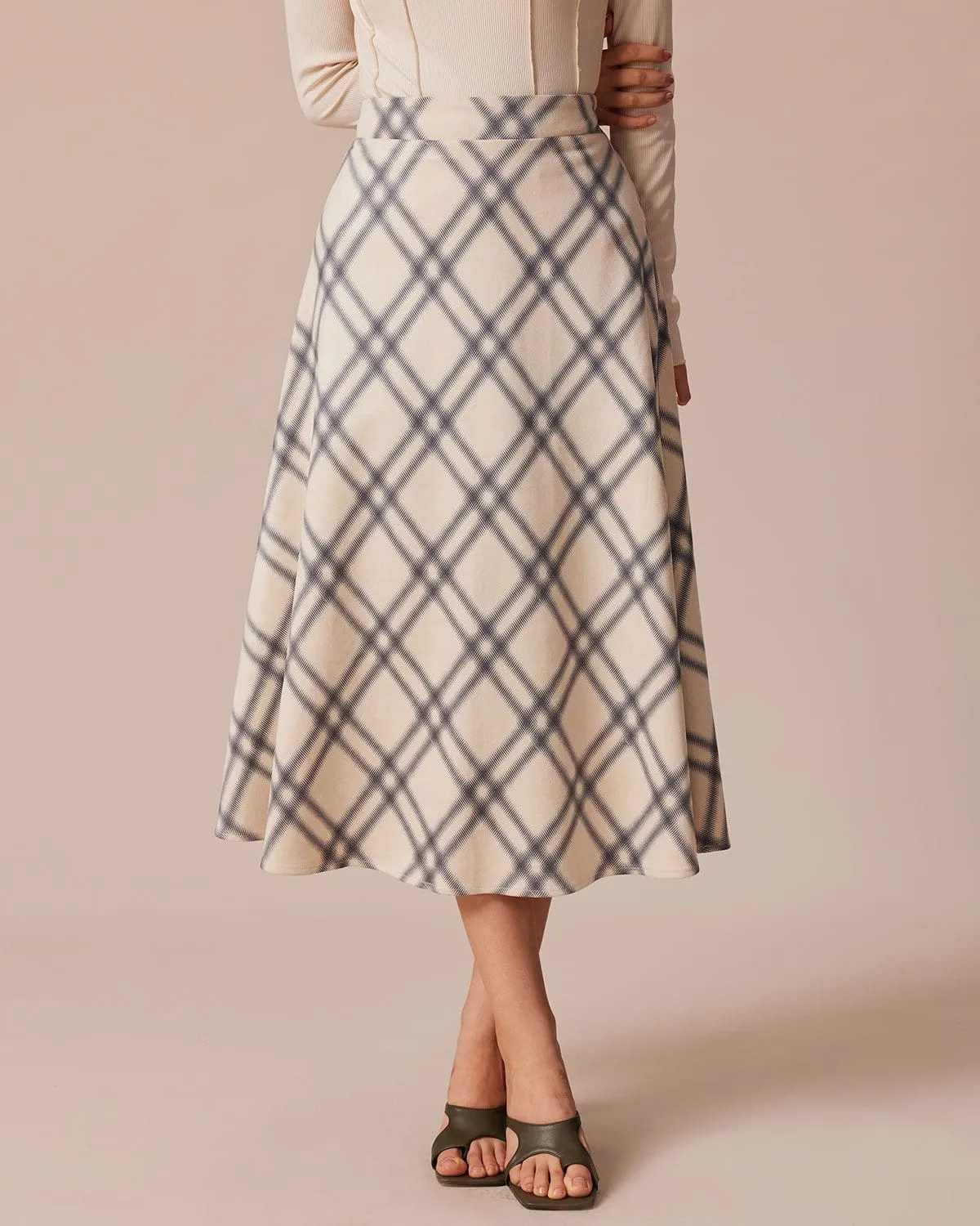 The Khaki High Waisted Plaid A-Line Midi Skirt sold by rihoas