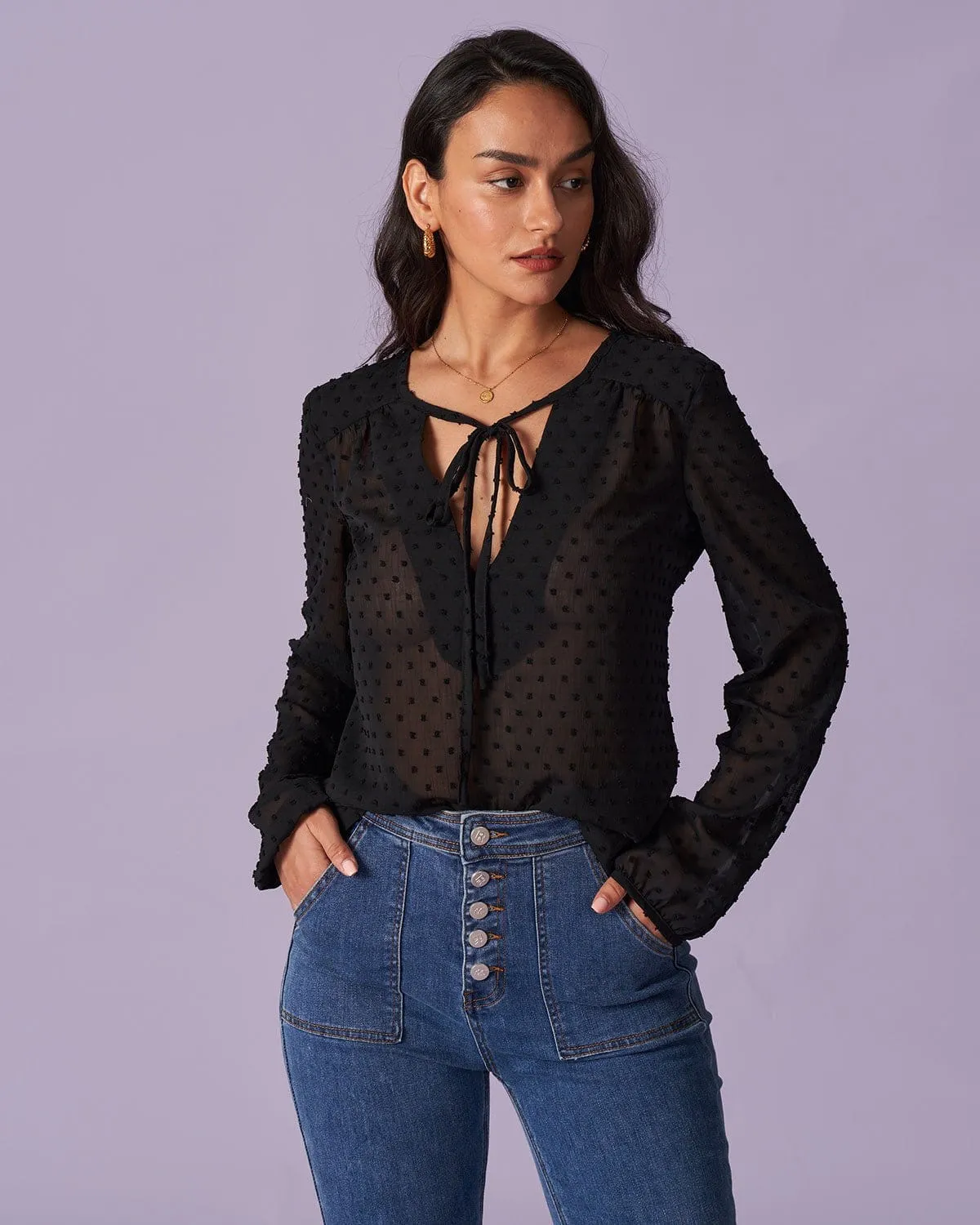 The Black V Neck Polka Dot Sheer Blouse sold by rihoas