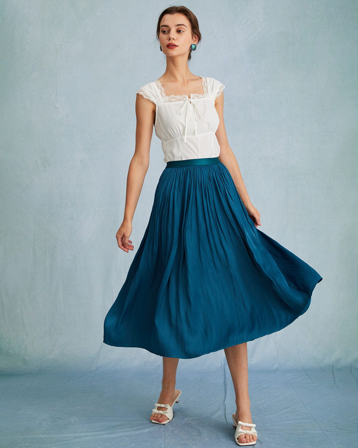 The Blue High Waisted Pleated Midi Skirt sold by rihoas product image thumbnail 2
