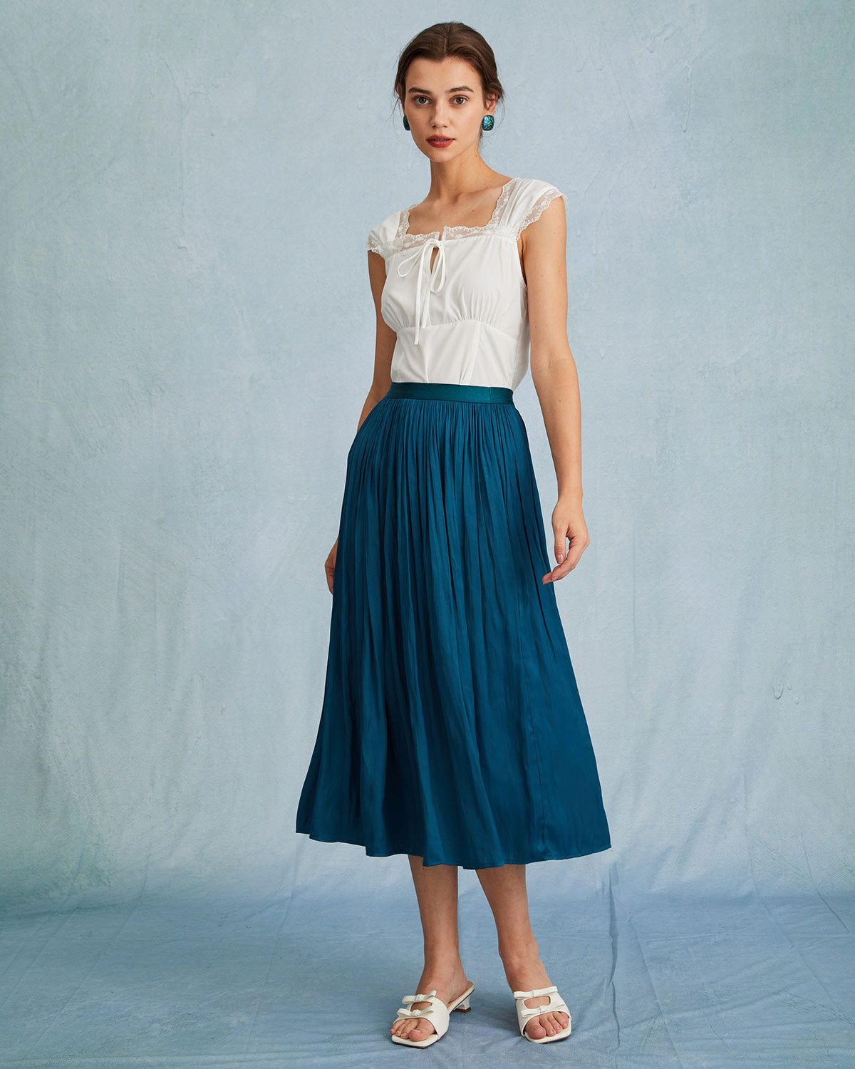 The Blue High Waisted Pleated Midi Skirt sold by rihoas product image thumbnail 4