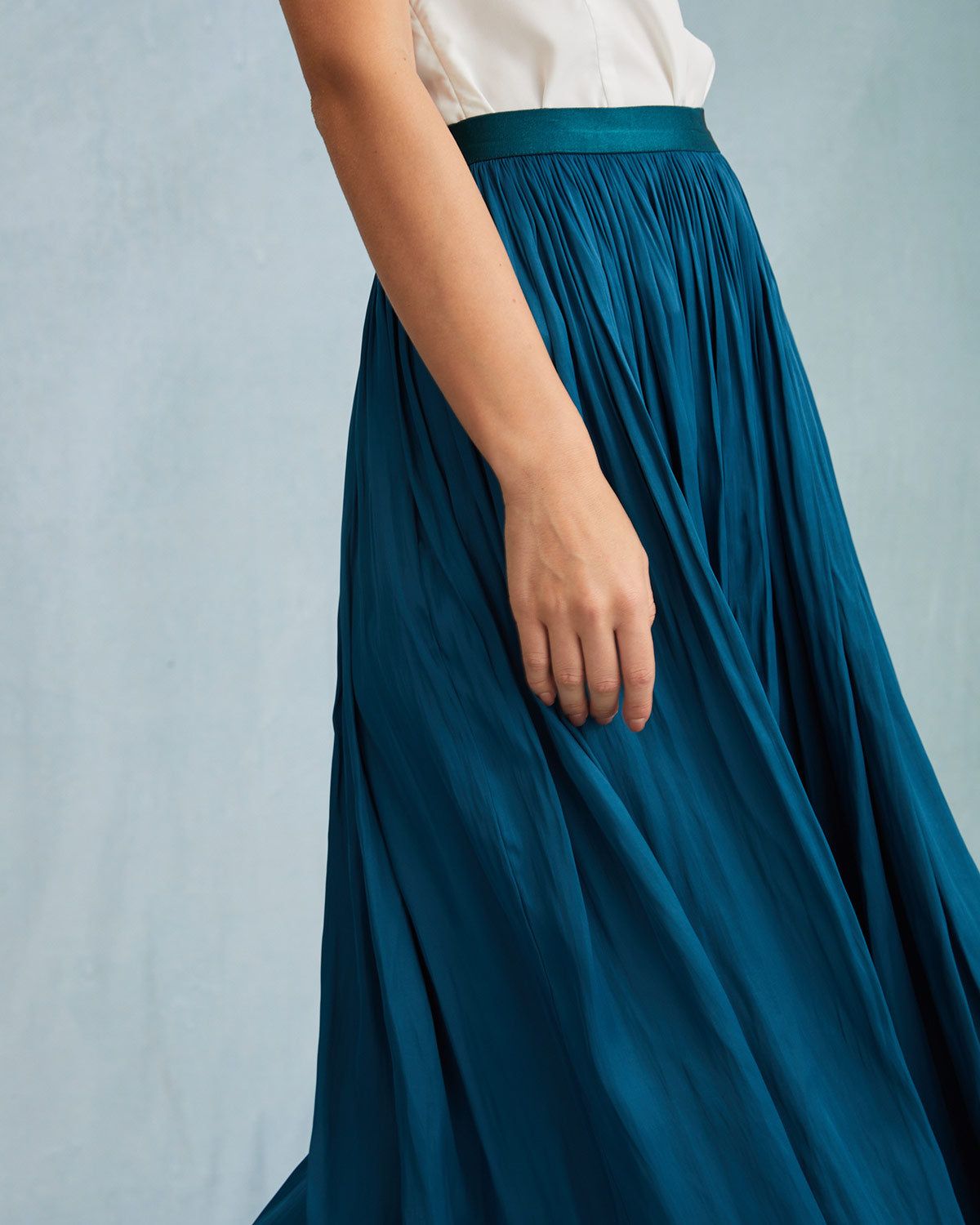 The Blue High Waisted Pleated Midi Skirt sold by rihoas product image thumbnail 3
