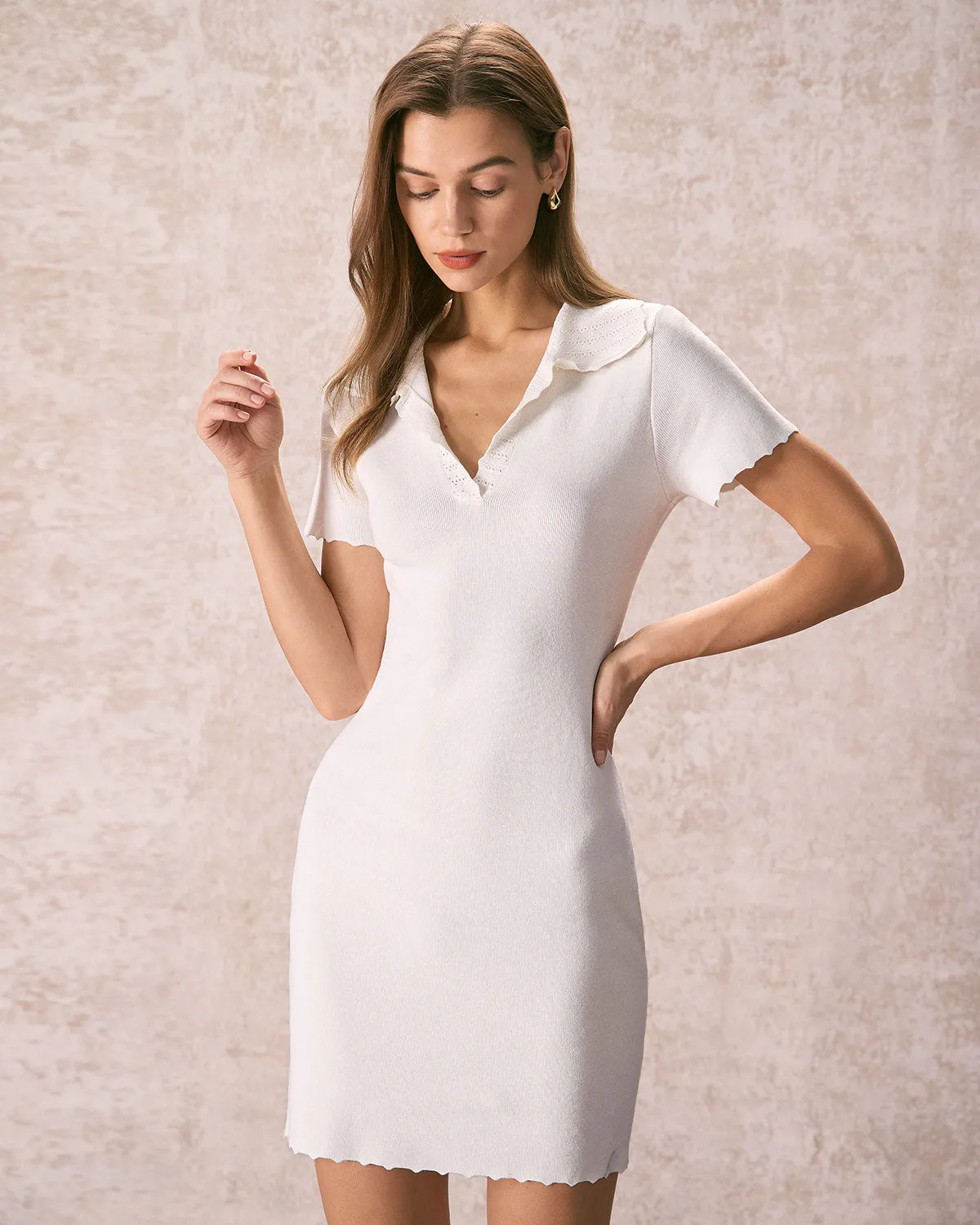 The White V Neck Scalloped Knit Mini Dress sold by rihoas