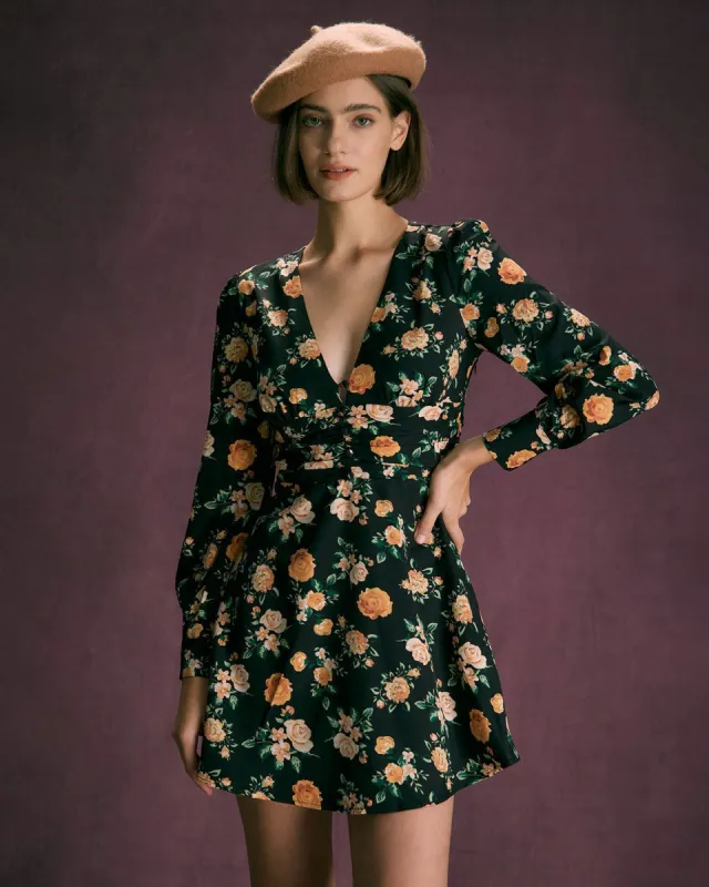 The Black V Neck Floral Pleated Mini Dress sold by rihoas