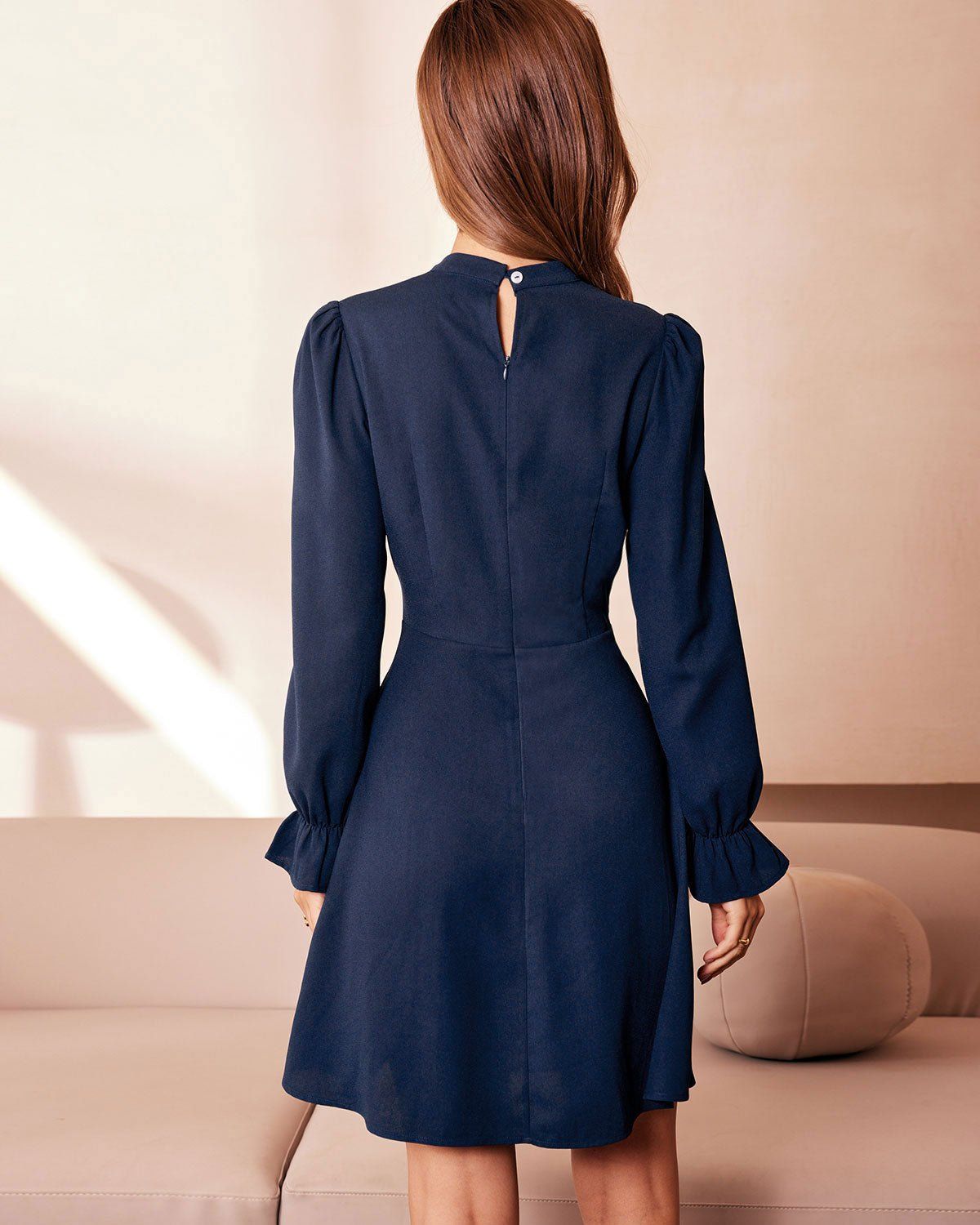 The Navy Mock Neck Ruffle Cutout Mini Dress sold by rihoas product image thumbnail 5